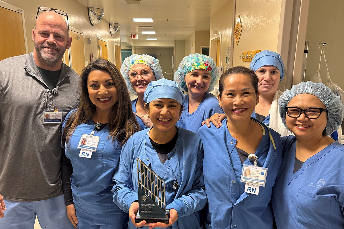 Nurses pose with an award