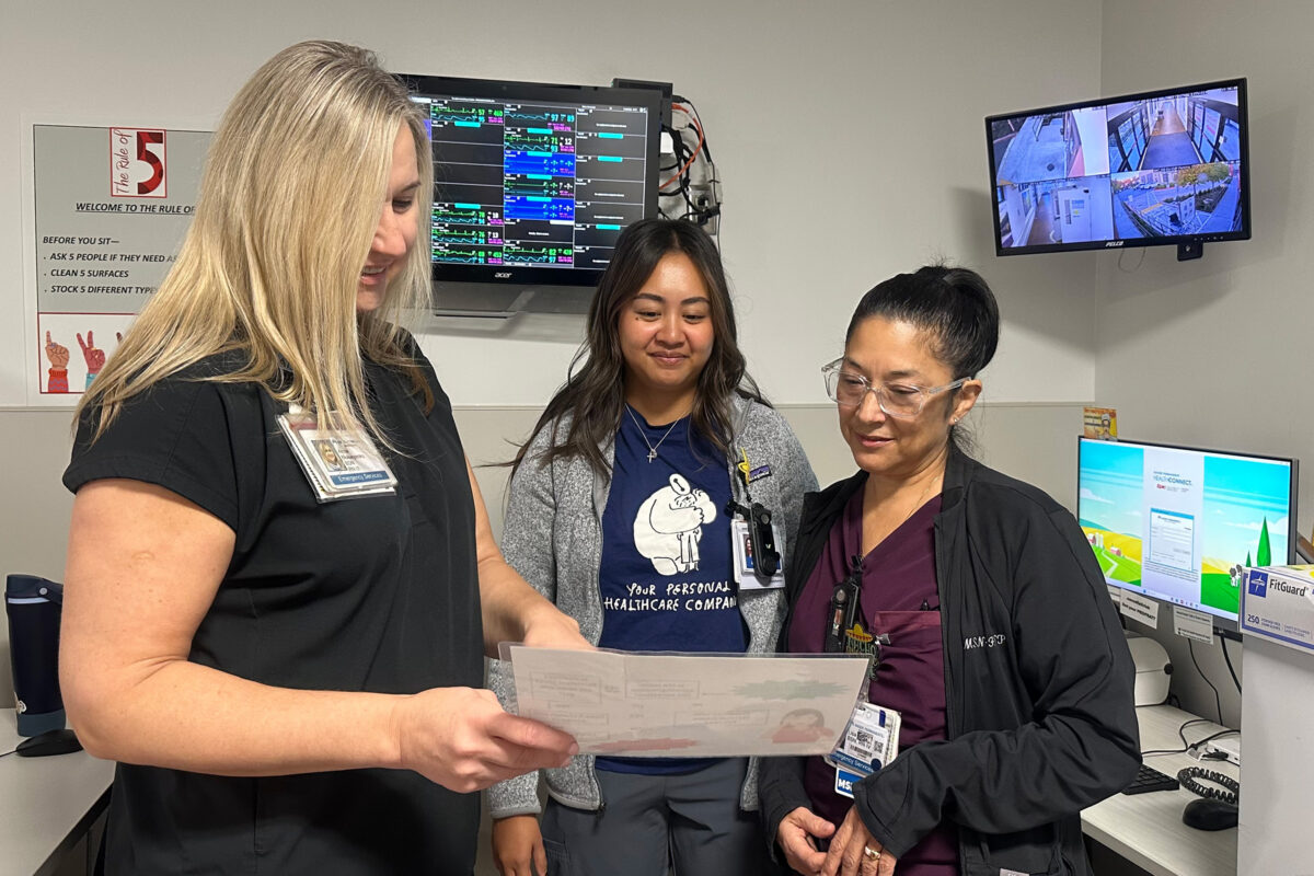 SAC ED nurses reviewing dizziness assessment guide