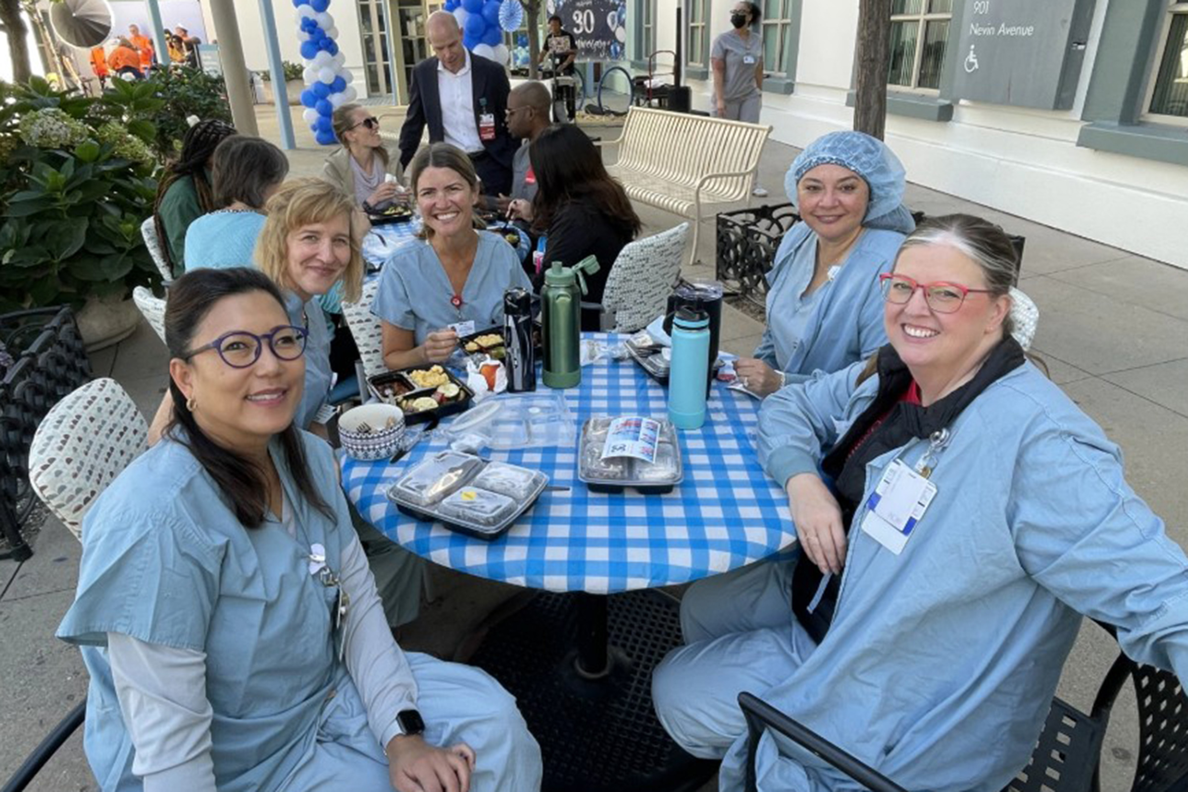 (L-R) Brittany Walker MSN, BSN, RN, Pickles, Dr. Pavna Sloan, DNP, MSN, NEA-BC, RNC-OB