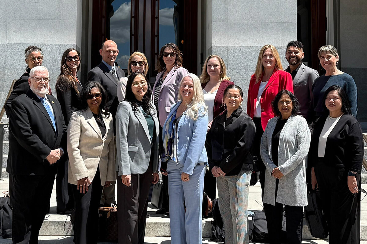 A group of KP nursing leaders standing on the steps of the California Capitol