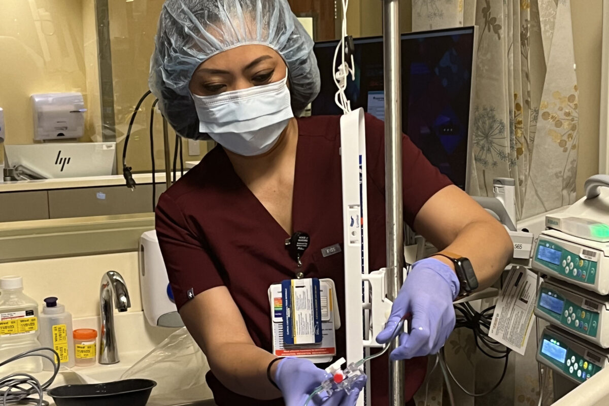 Nurse with an IV pump
