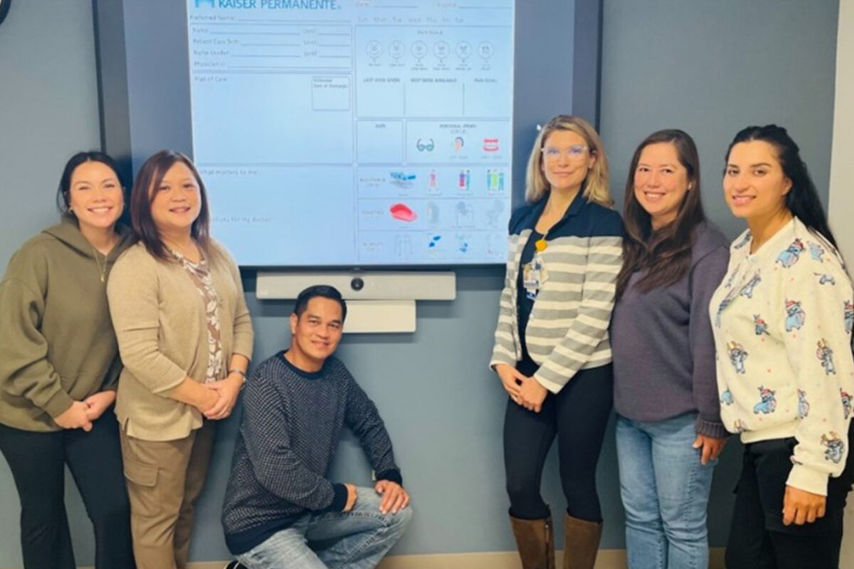 1North nurses next to the care board
