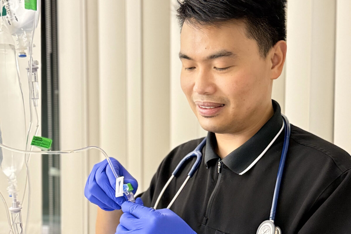 Nurse at an IV pump