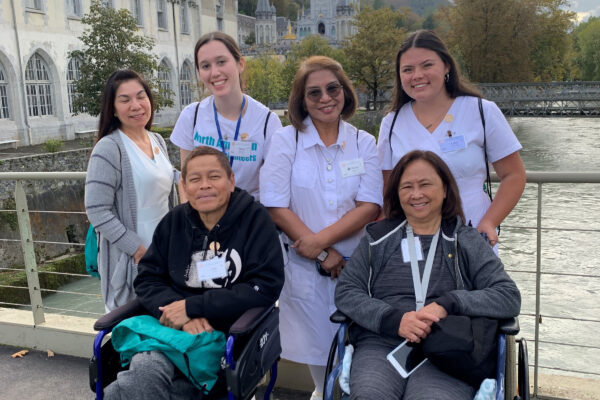 a group of nurses smiling