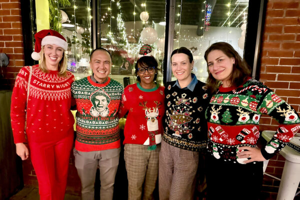 Nurses smiling in christmas sweaters