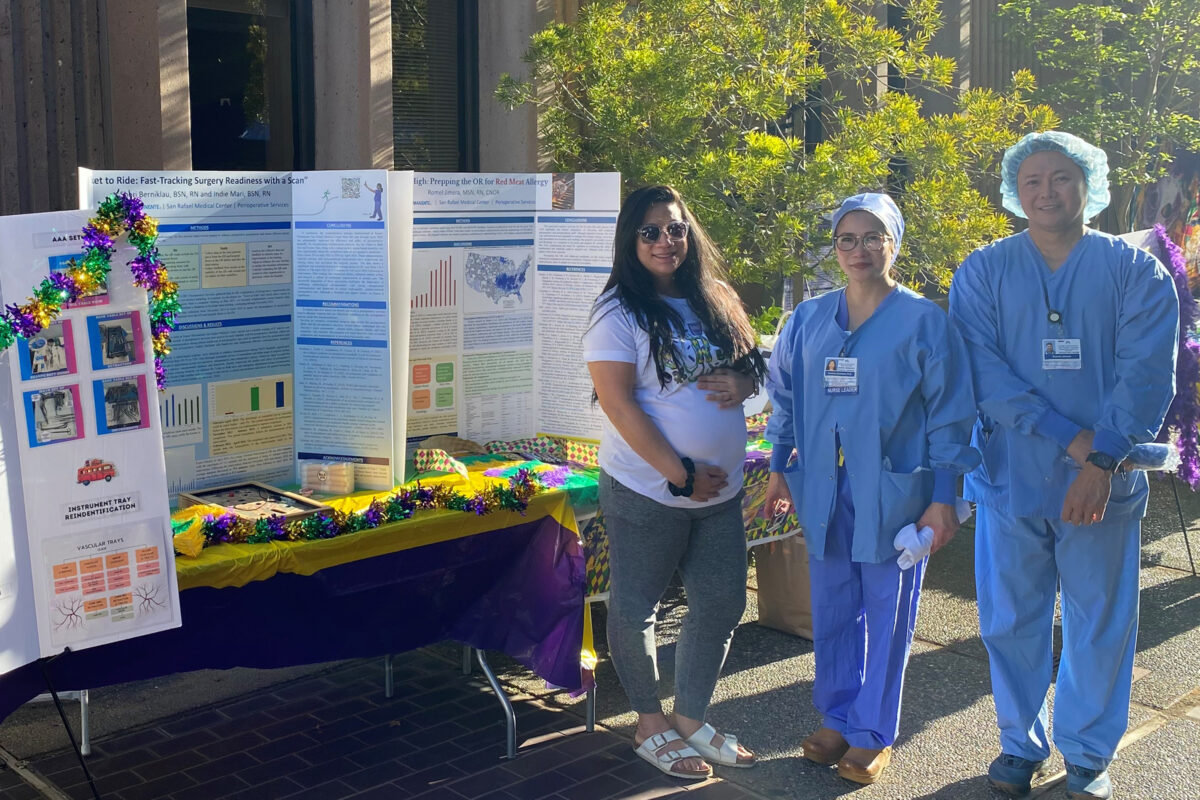 3 nurses present their poster