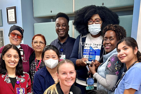 Group of nurses holding an award