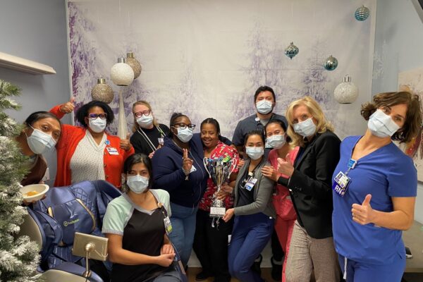 Large group of nurses in masks.