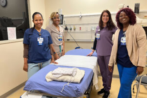Nurses in a patient room 