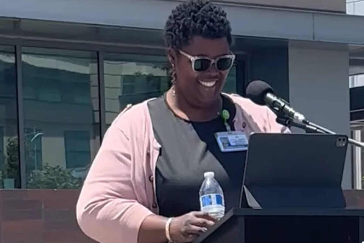 Sonjanae Shand speaking at the Juneteenth event.