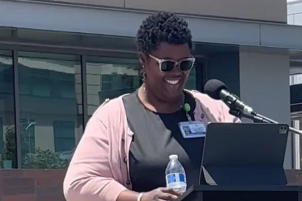 Sonjanae Shand speaking at the Juneteenth event.