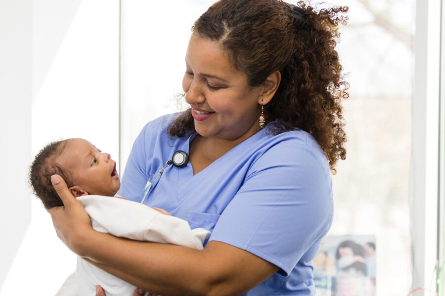 Nurse holding a newborn