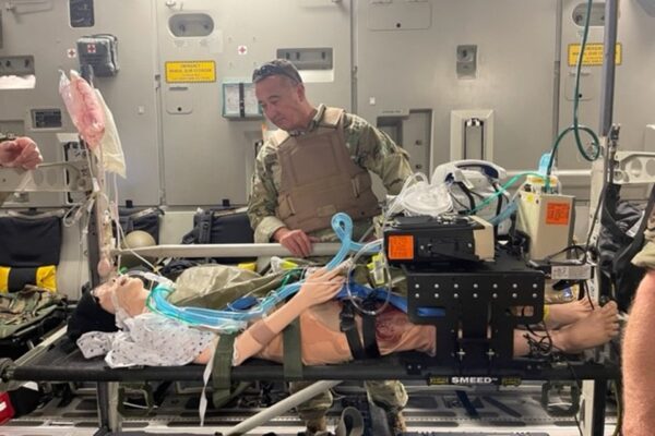 George McEnroe in training as a member of a specialized U.S. Airforce surgical unit.