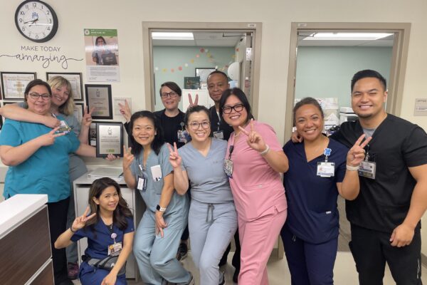 A group of nurses smiling