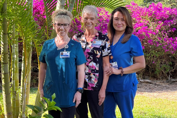 Three nurses smiling