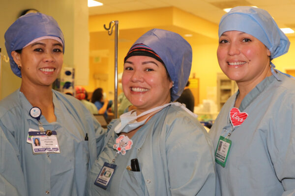 3 nurses in scrubs
