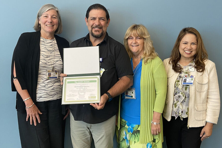 Michael Tijerina receiving the DAISY award