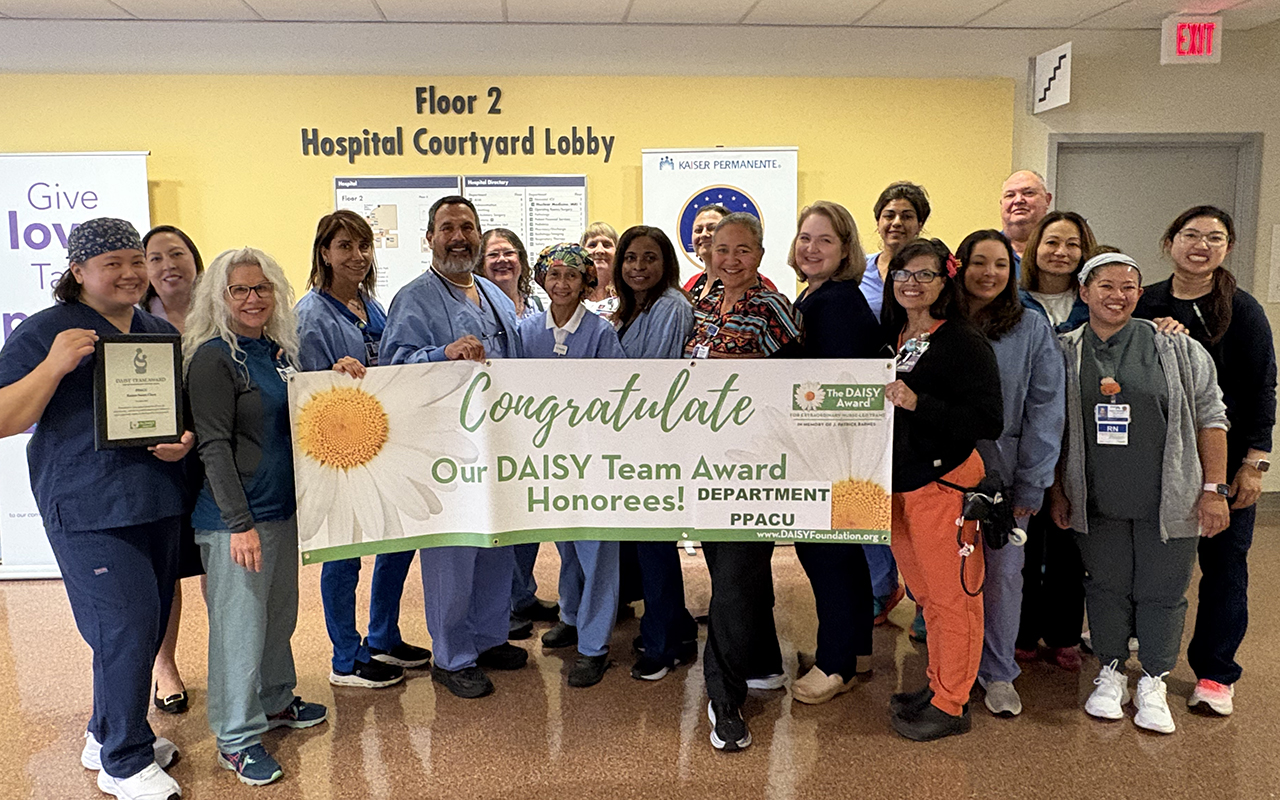 Santa Clara PPACU nurses holding a DAISY banner